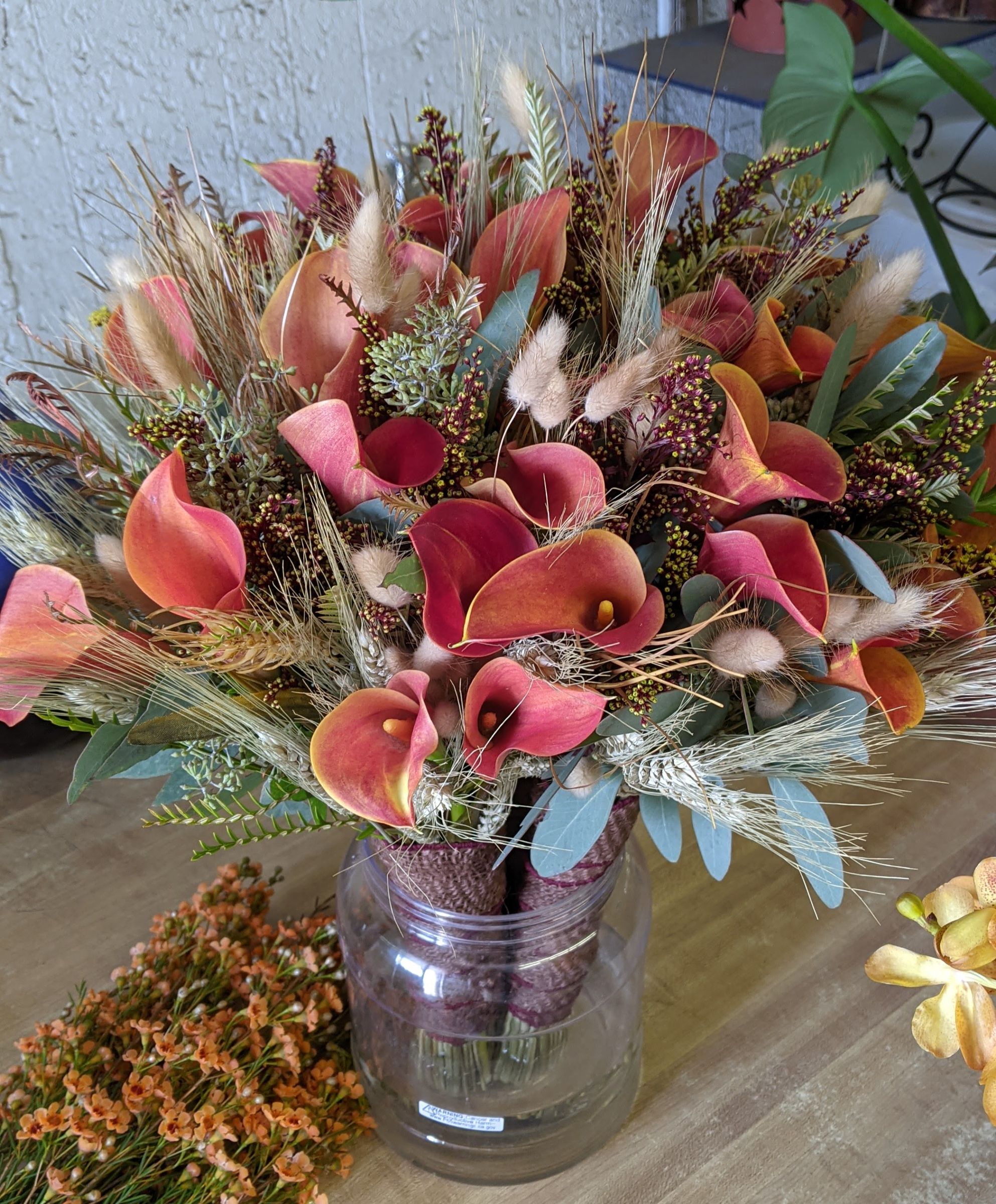 Calla lily and dried-flower arrangement